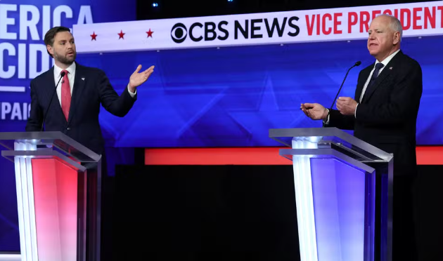 J.D. Vance e Tim Walz no debate vice-presidencial, nos Estados Unidos, em 1º de outubro de 2024 — Foto: REUTERS/Mike Segar