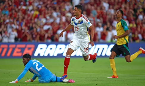 Eric Ramírez de camisa branca marcando o terceiro gol da Venezuela. (Aric Becker / AFP)