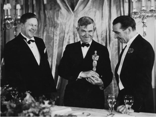Da esquerda para a direita: Franklin Hansen, Will Rogers e Frank Lloyd. Imagem: Cinema Clássico.